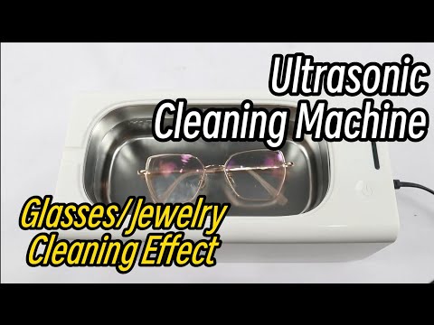 La macchina per la pulizia ad ultrasuoni mostra l'effetto della pulizia degli occhiali